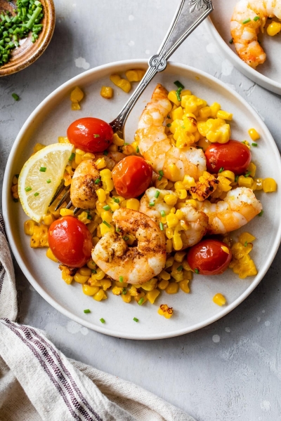 Old Bay Sheet Pan Shrimp with Corn and Tomatoes